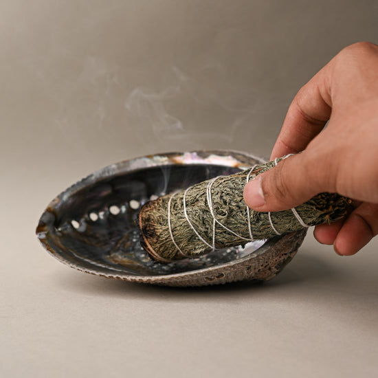 Burning Cedar smudge stick