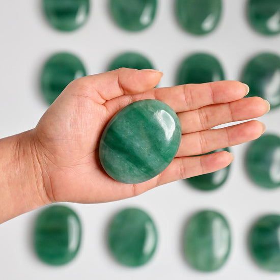 Green jade  palm stone on palm