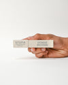Hand holding Dorjee-Stupa-Incense-Tube 