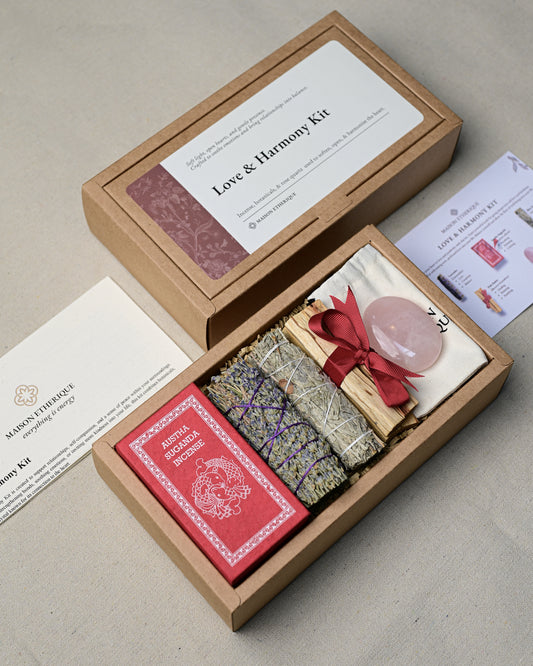 Open Love and Harmony Kit seen at an angle, with its lid, card and guide leaflet beside it.