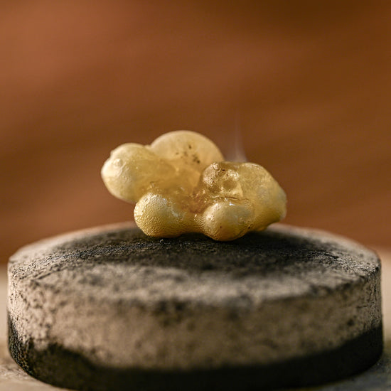 Macro shot of frankincense melting