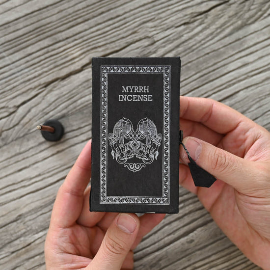 Hands holding Myrrh Incense Stick Box