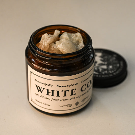 Opened jar of White copal