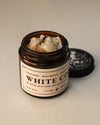 Opened jar of White copal