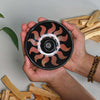 Hands holding A Palo Santo Stick Burner - Fire