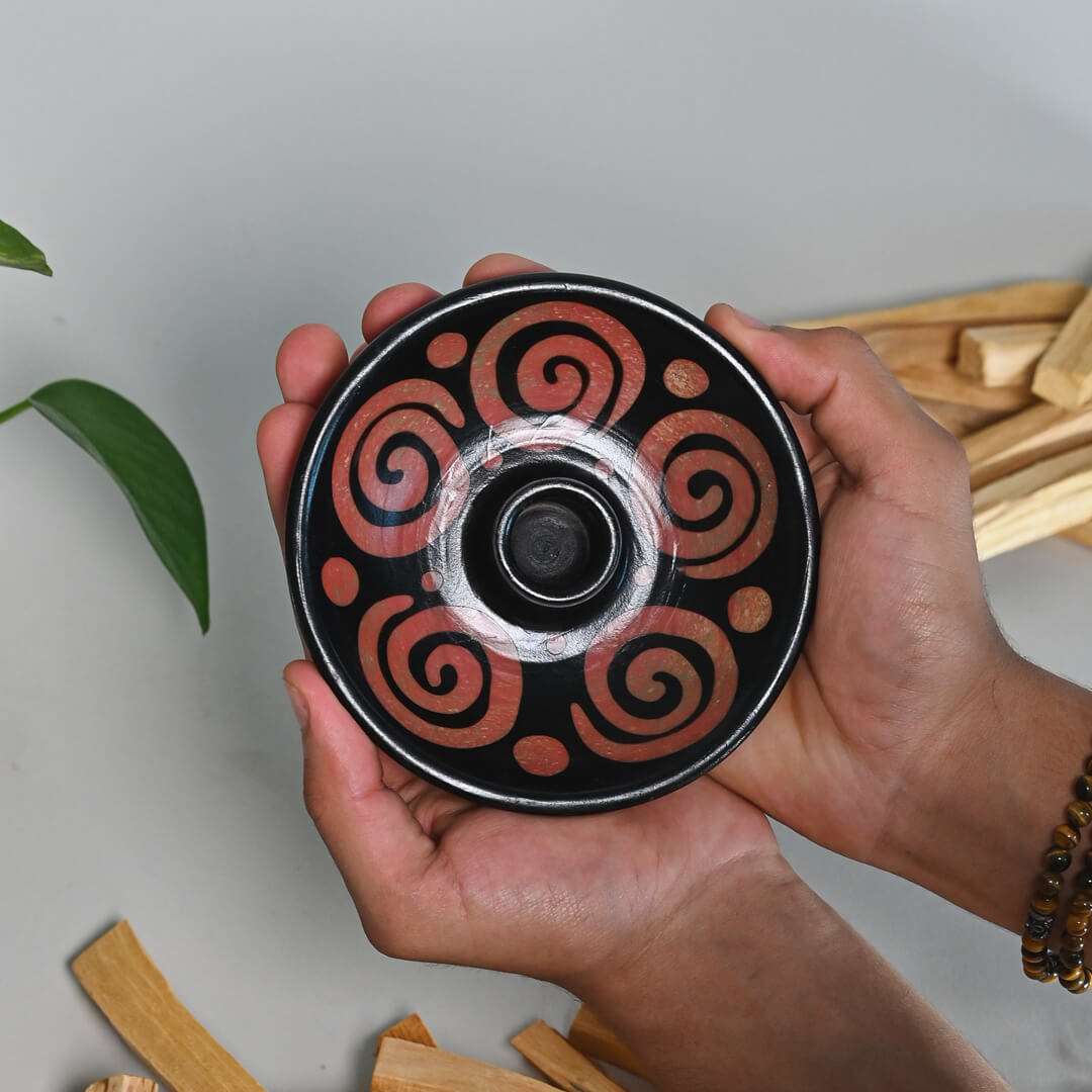 Hands holding A Palo Santo Stick Burner - Air