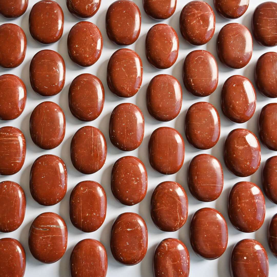 Red Jasper Palm Stones placed together