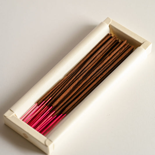 An open box of Sacred Sandalwood Incense Stick