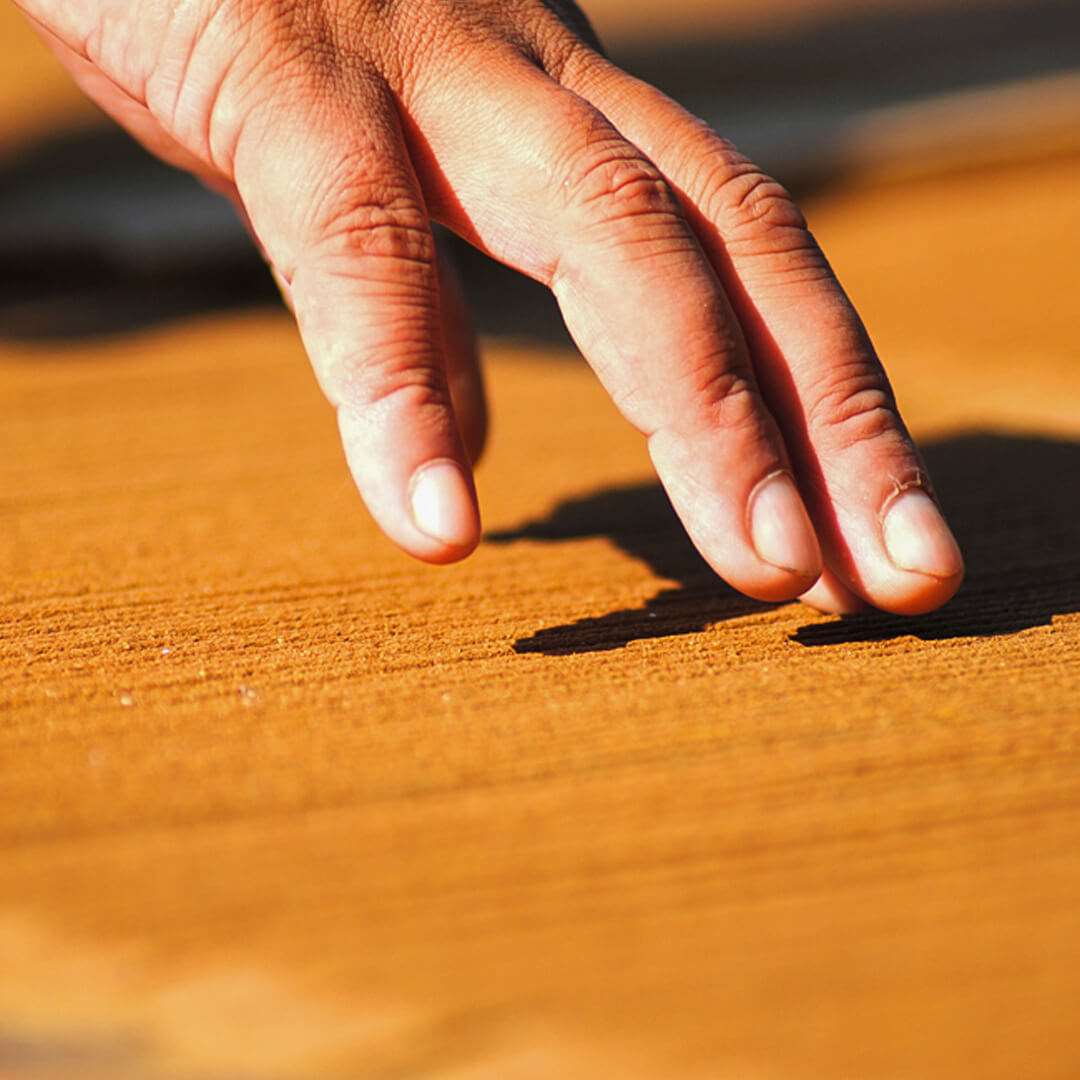 Hands making Nag Champa Incense sticks 